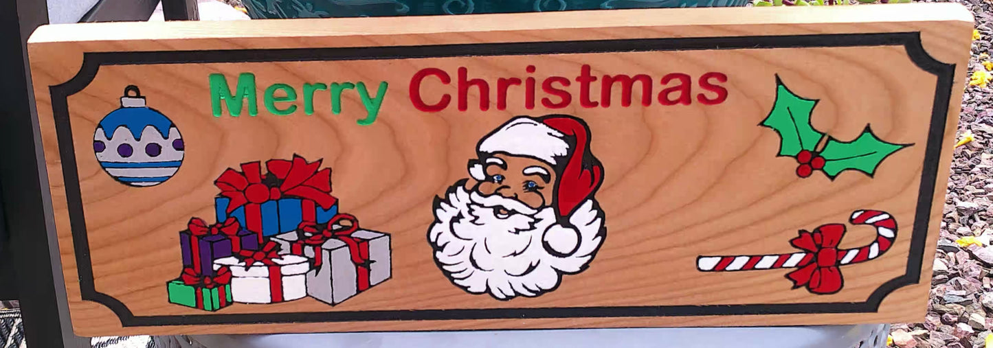Wooden Christmas sign with Santa Claus, presents, and ornaments on a wooden background.