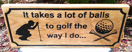 Wooden sign with golf-themed text and graphics on a blurred natural background
